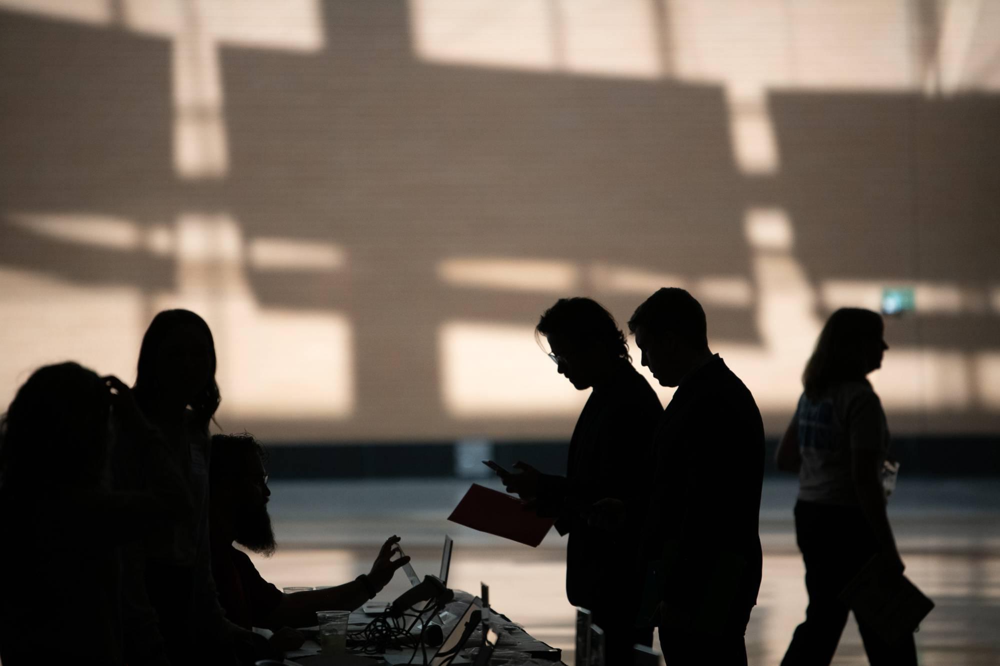 shadows of people at career fair